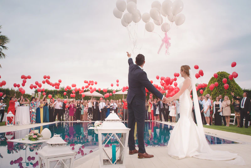 Photographer uploading wedding photos to PhotoHouse